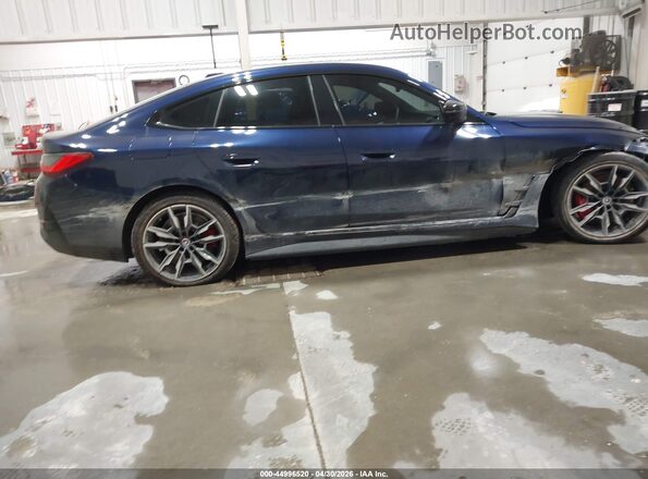 WBY33AW06PFP31605 2023 BMW I4 Blue Rear interior view