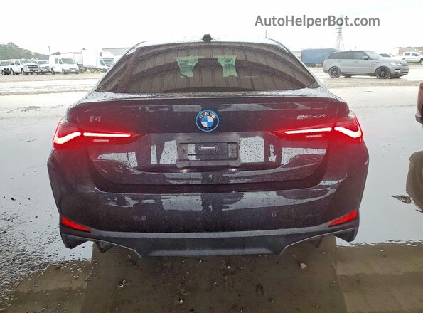 WBY43AW06PFP47016 2023 BMW I4 Black Widok z tyłu