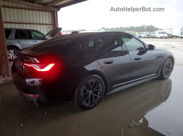 WBY43AW06PFP47016 2023 BMW I4 Black Tył prawy