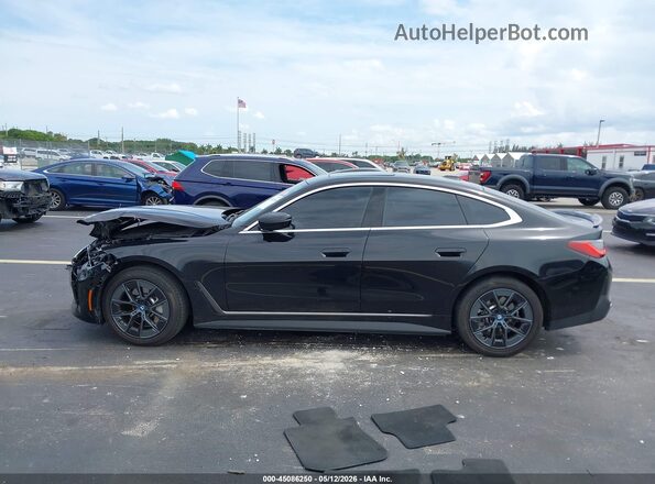 WBY43AW08PFR29462 2023 BMW I4 Black Սալոնի 360 աստիճան տեսք