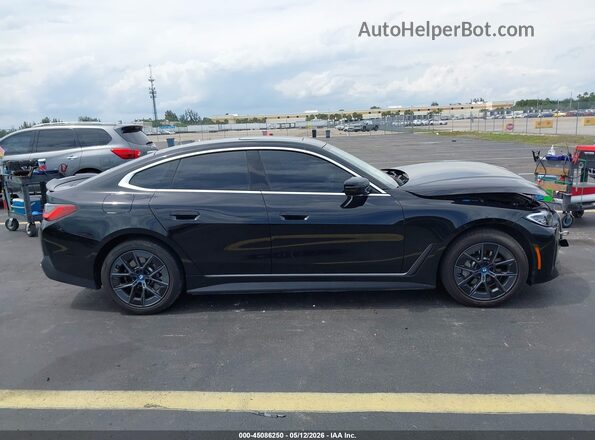 WBY43AW08PFR29462 2023 BMW I4 Black Սալոնի հետևի տեսք