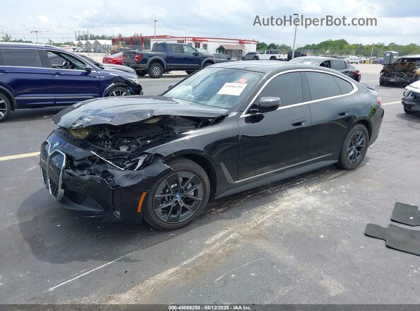 WBY43AW08PFR29462 2023 BMW I4 Black Առջևի ձախ երեք քառորդ տեսարան