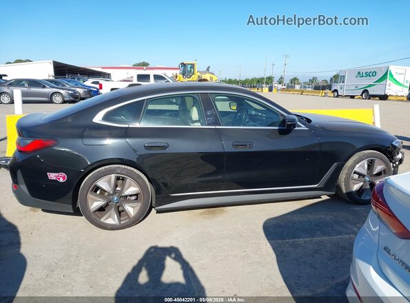 WBY43AW09RFT41332 2024 BMW I4 Black Панорамний вид салону 360°