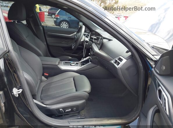 WBY43HD06SFU60439 2025 BMW I4 Black Front interior view