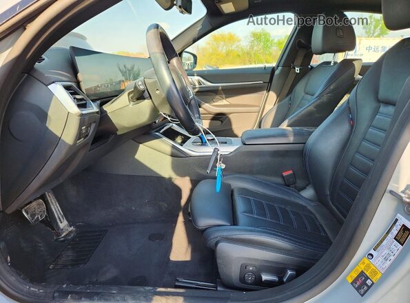 WBY73AW00PFN55345 2023 BMW I4 Gray Vista interior delantera