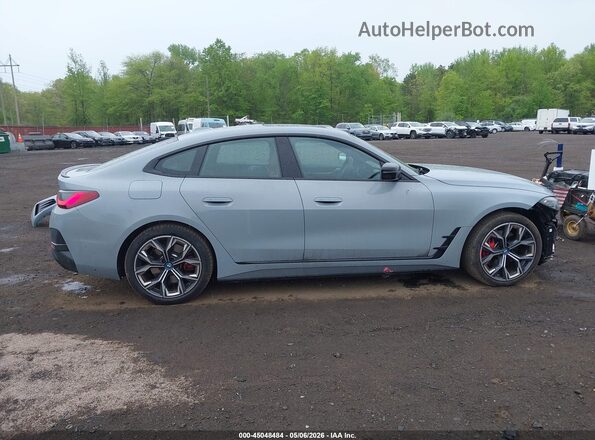 WBY83FB04RFT01700 2024 BMW I4 Gray Vista interior trasera
