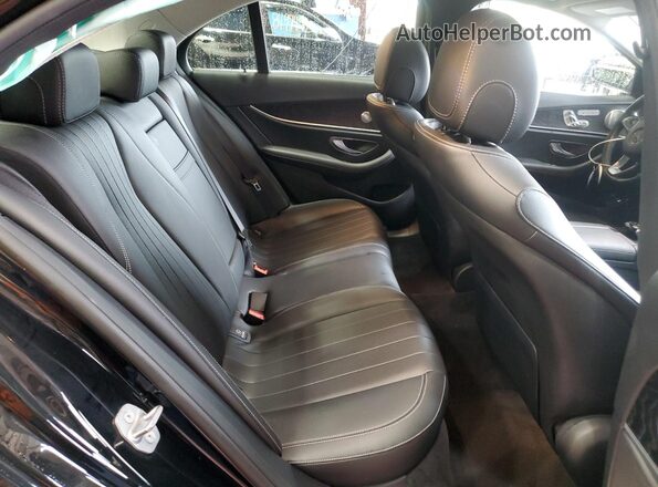 WDDZF4KB0JA371706 2018 MERCEDES-BENZ E Black Vista de los asientos traseros