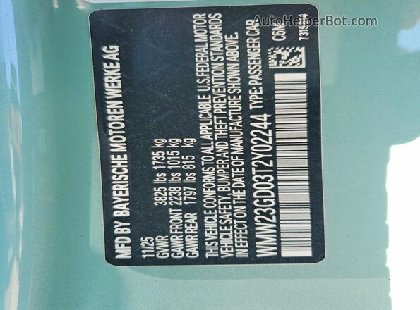WMW23GD03T2Y02244 2026 MINI COOPER Turquoise Widok naklejki z numerem VIN