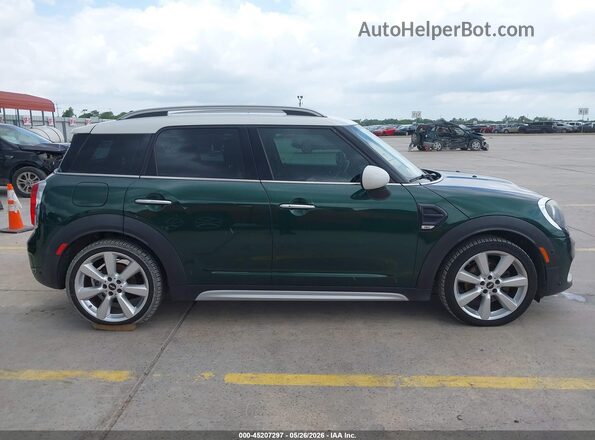 WMZYS7C33J3E08636 2018 MINI COUNTRYMAN Green Vista interior trasera