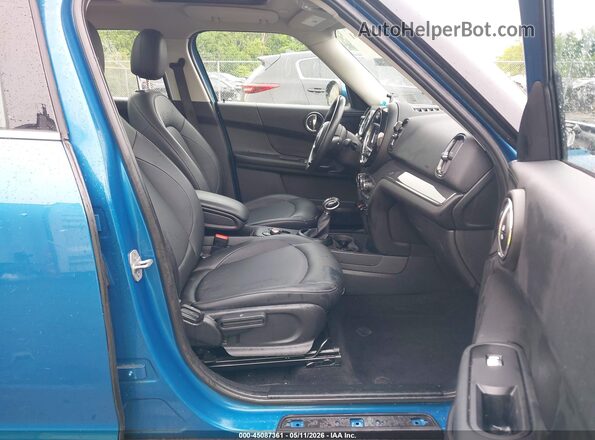WMZYS7C50K3F44791 2019 MINI COUNTRYMAN Blue Front interior view