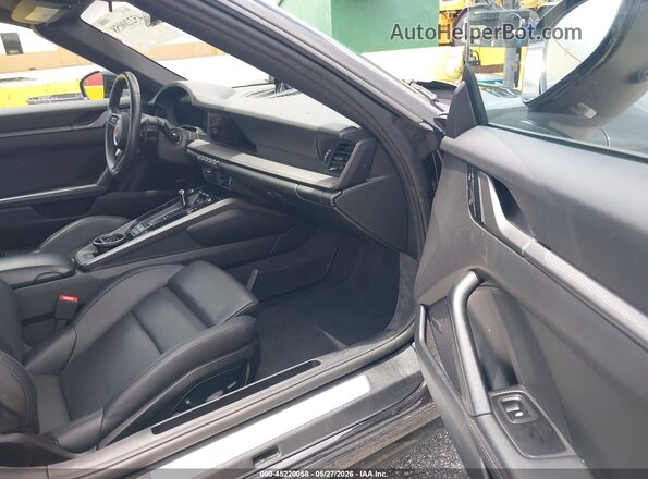 WP0CA2A97SS236199 2025 PORSCHE 911 Черный Вид салона спереди