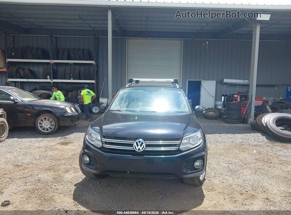 WVGAV7AX4GW543574 2016 VOLKSWAGEN TIGUAN Черный Вид спереди