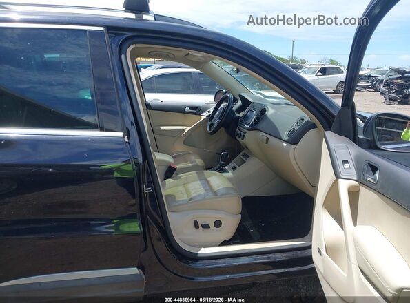 WVGAV7AX4GW543574 2016 VOLKSWAGEN TIGUAN Черный Вид салона спереди