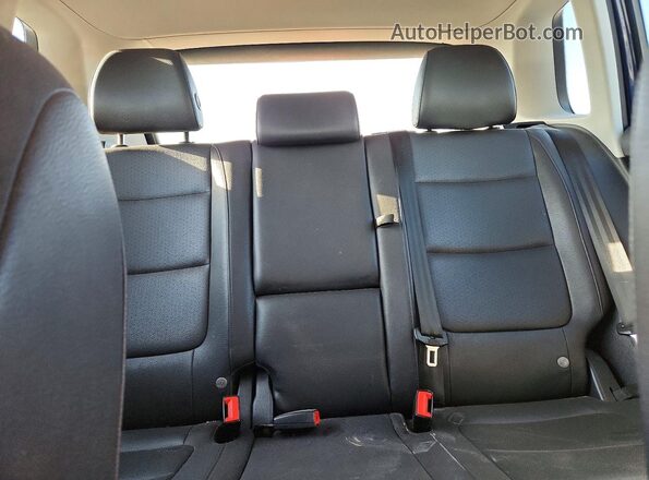 WVGAV7AX5GW555944 2016 VOLKSWAGEN TIGUAN Blue Vista de los asientos traseros