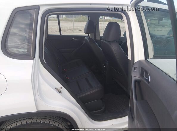 WVGAV7AX9GW511798 2016 VOLKSWAGEN TIGUAN White VIN კოდის სტიკერის ხედი