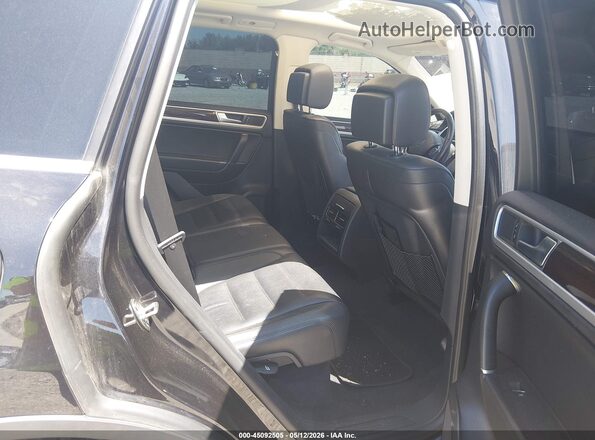 WVGEF9BP0GD001196 2016 VOLKSWAGEN TOUAREG Black Vista de la etiqueta del VIN