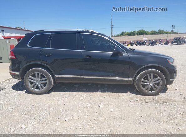 WVGEF9BP0GD001196 2016 VOLKSWAGEN TOUAREG Black Vista interior trasera