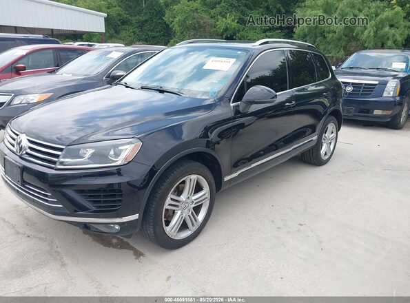 WVGEF9BP3GD000592 2016 VOLKSWAGEN TOUAREG Black Front left