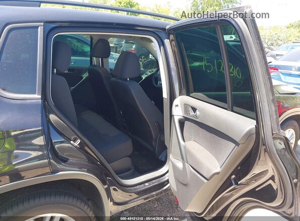 WVGJV7AX9GW030403 2016 VOLKSWAGEN TIGUAN Black VIN կոդի պիտակի տեսք