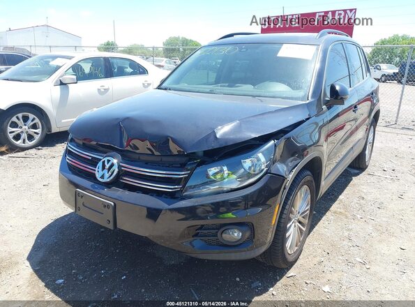 WVGJV7AX9GW030403 2016 VOLKSWAGEN TIGUAN Black Դիմացի տեսք