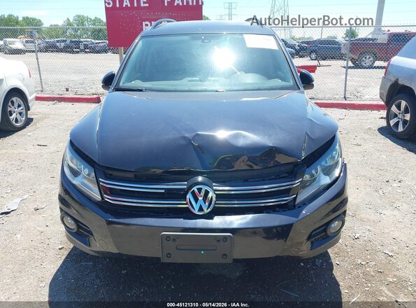 WVGJV7AX9GW030403 2016 VOLKSWAGEN TIGUAN Black Սարքավորումների վահանակի տեսք