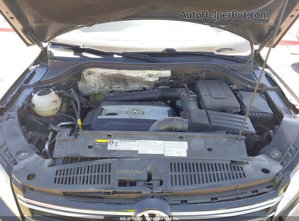 WVGJV7AX9GW030403 2016 VOLKSWAGEN TIGUAN Black Հետևի տեսք