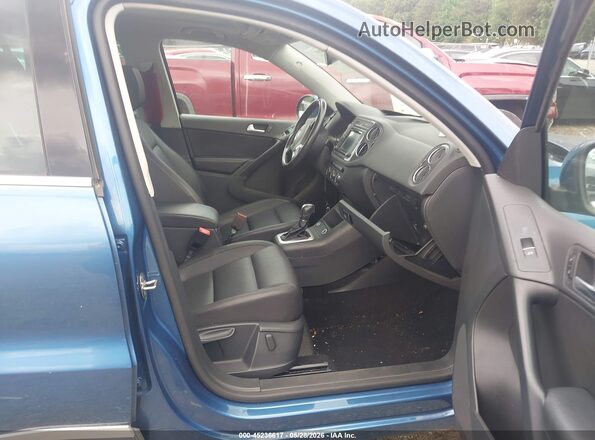 WVGRV7AX6HW506594 2017 VOLKSWAGEN TIGUAN Blue წინა სალონის ხედი