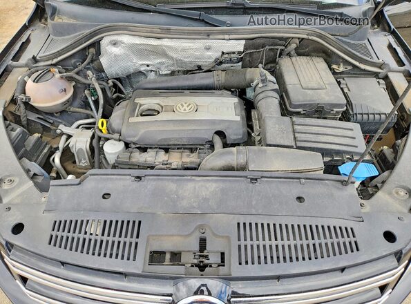 WVGSV7AX0HK010554 2017 VOLKSWAGEN TIGUAN Черный Вид задней части салона