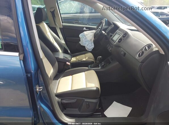WVGSV7AX2HK002486 2017 VOLKSWAGEN TIGUAN Синий Вид салона спереди
