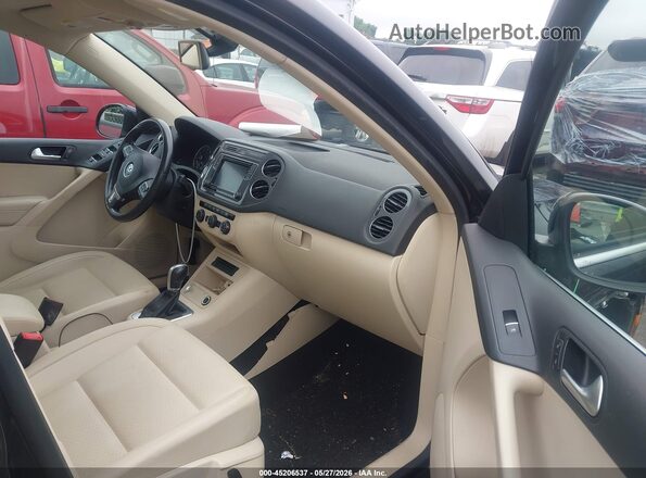 WVGSV7AX2HK015142 2017 VOLKSWAGEN TIGUAN Black წინა სალონის ხედი