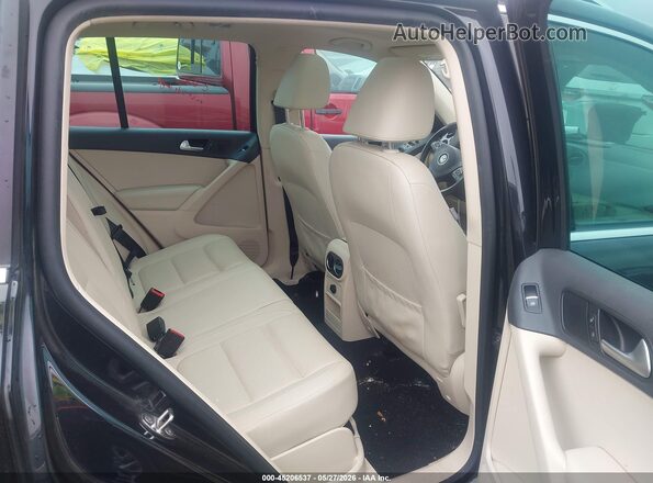 WVGSV7AX2HK015142 2017 VOLKSWAGEN TIGUAN Black VIN კოდის სტიკერის ხედი