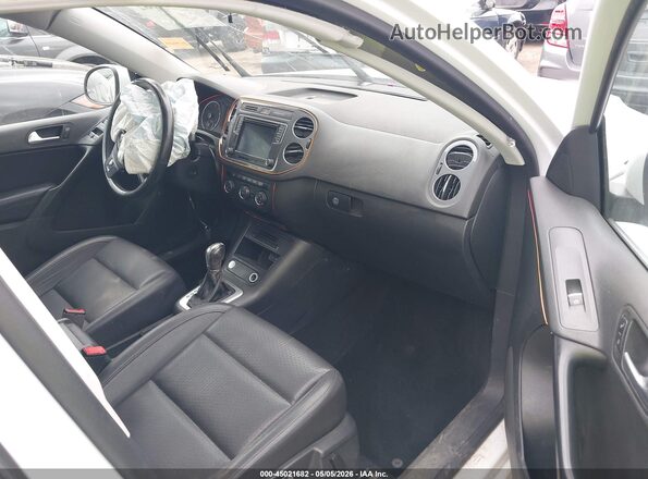 WVGSV7AX7HW511207 2017 VOLKSWAGEN TIGUAN White წინა სალონის ხედი