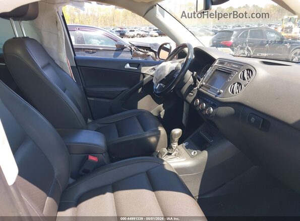 WVGSV7AX9HK007930 2017 VOLKSWAGEN TIGUAN Silver წინა სალონის ხედი