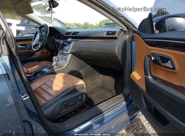 WVWRP7AN9GE518157 2016 VOLKSWAGEN CC Blue Front interior view