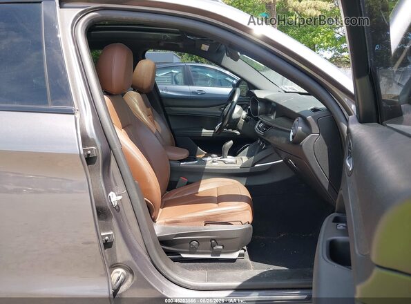 ZASPAKBN0P7D54187 2023 ALFA ROMEO STELVIO Gray Vista interior delantera