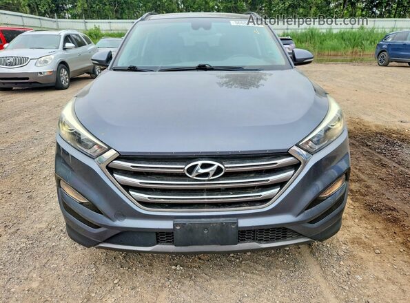 KM8J3CA23GU044036 2016 HYUNDAI TUCSON Gray უკანა ხედი