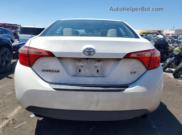 5YFBURHE0HP606269 2017 TOYOTA COROLLA White წინა სალონის ხედი