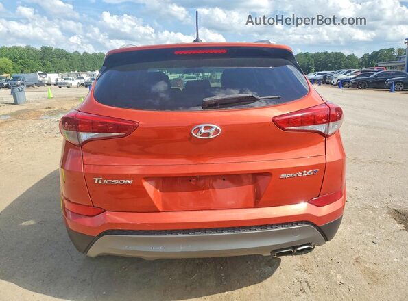 KM8J33A2XGU112140 2016 HYUNDAI TUCSON Orange წინა სალონის ხედი