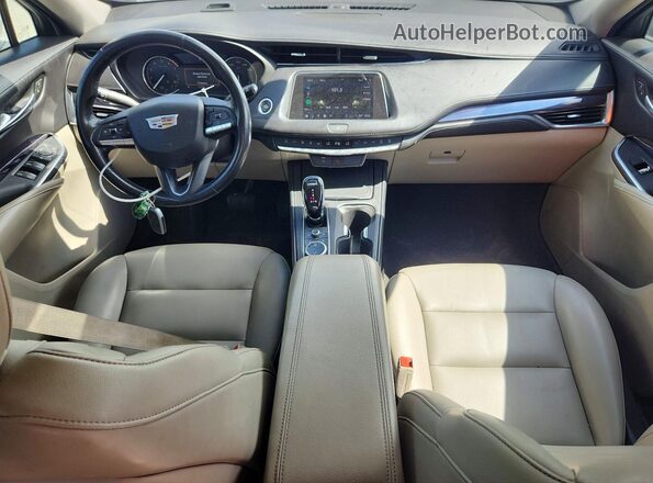 1GYAZAR48PF104176 2023 CADILLAC XT4 White 