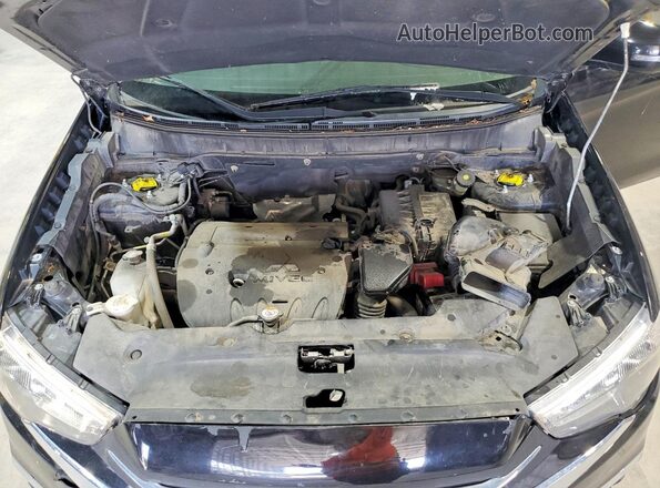 JA4AP3AW7JZ009709 2018 MITSUBISHI OUTLANDER Black Vista de la etiqueta del VIN