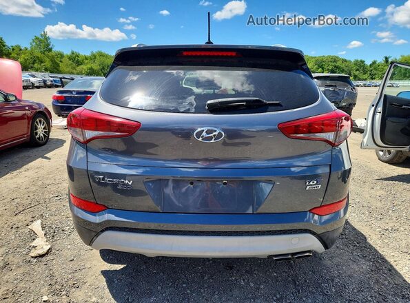 KM8J3CA21HU288141 2017 HYUNDAI TUCSON Серый 