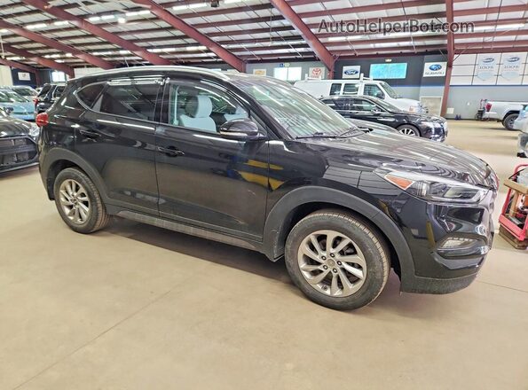 KM8J3CA22GU043878 2016 HYUNDAI TUCSON Черный Вид спереди