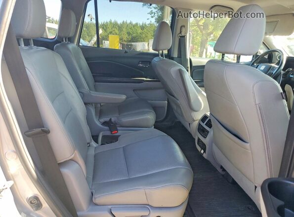 5FNYF6H00GB037750 2016 HONDA PILOT Серебряный Вид задней части салона