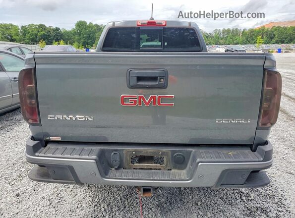 1GTP6EE18K1208782 2019 GMC CANYON Gray Вид салону спереду