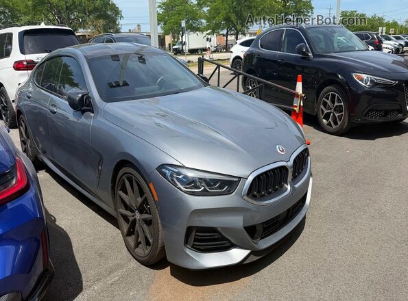 WBAGV8C09PCK90335 2023 BMW M8 Gray Rear left