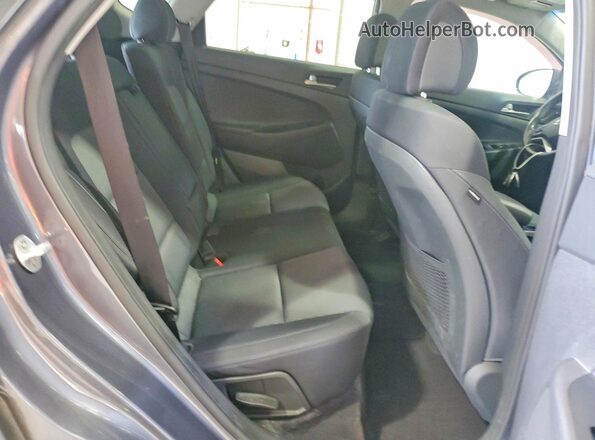 KM8J3CA20JU823336 2018 HYUNDAI TUCSON Gray უკანა სალონის ხედი