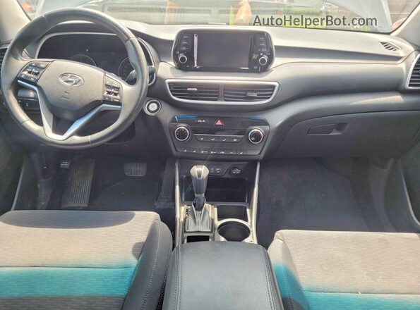 KM8J3CA42LU239606 2020 HYUNDAI TUCSON Charcoal Vista de los asientos traseros
