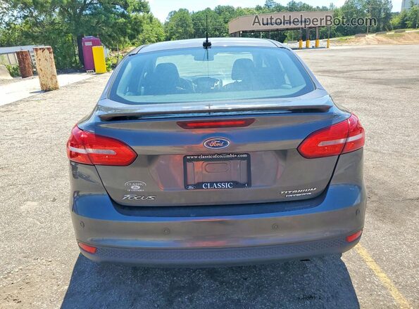 1FADP3J20GL215357 2016 FORD FOCUS Charcoal Вид салону спереду
