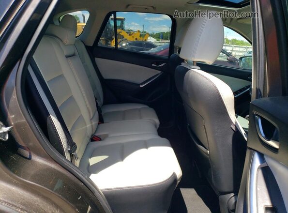 JM3KE4DY9G0773262 2016 MAZDA CX-5 Brown Rear interior view