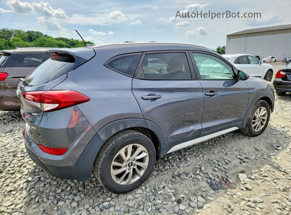KM8J3CA49HU496768 2017 HYUNDAI TUCSON Gray 
